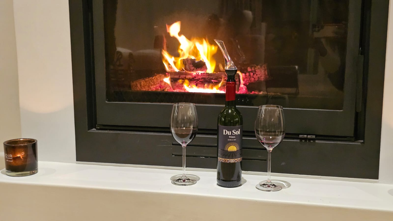 Shiraz by a fireplace